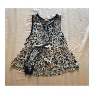 Flower patterned blouse with tassels